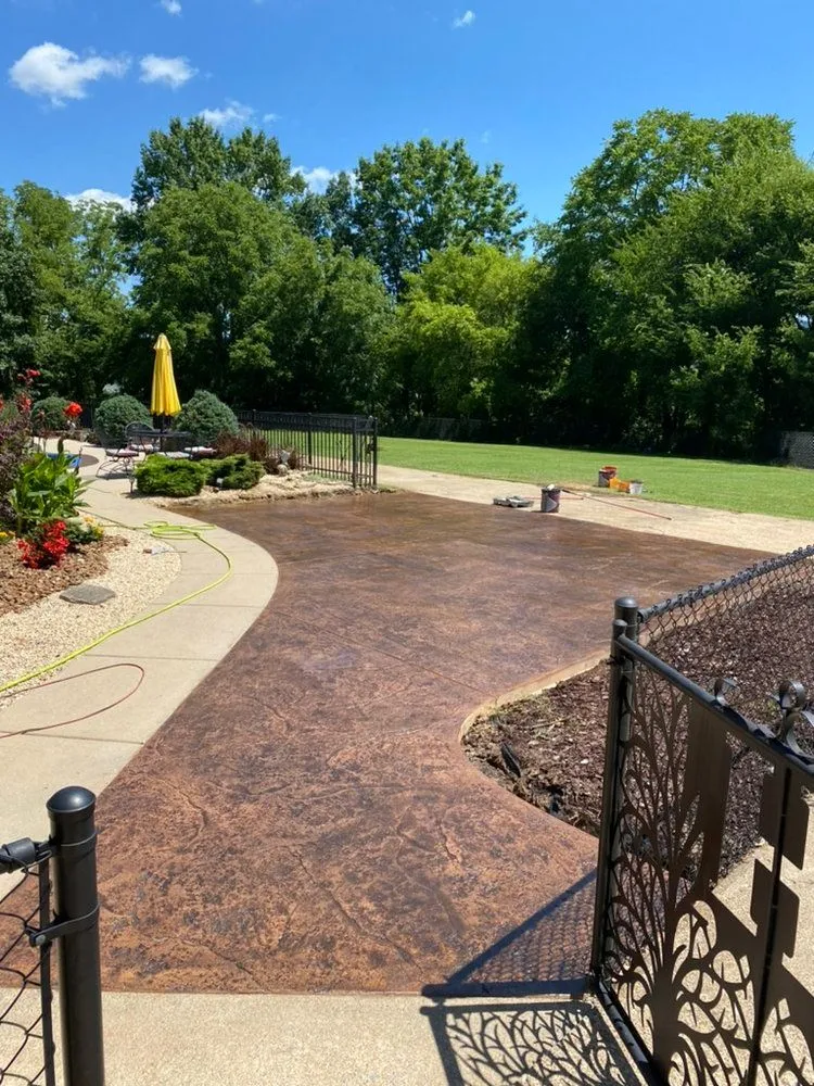 brown stone stamped concrete walkway area