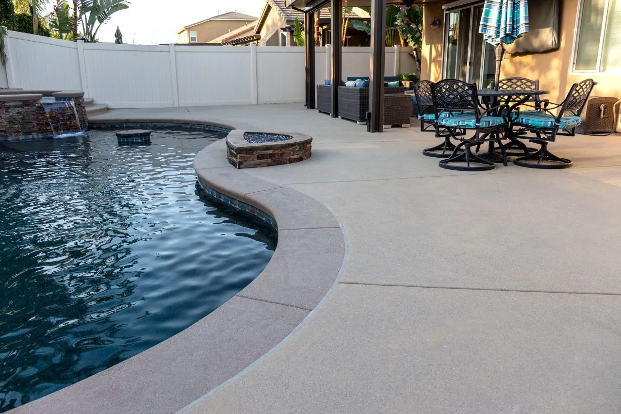 kool deck pool surface with fire feature